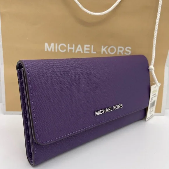 Michael Kors Lg Jet Set Travel Trifold Leather Wallet 
Dark Purple 
NWT - Picture 11 of 16